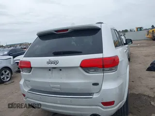 2014 Jeep Grand Cherokee Overland with VIN 1C4RJECG3EC266659, listed as a IAAI auction lot 41363419 with 142,896 mi miles. Bid and sale history available at carsss.com. Image 17.