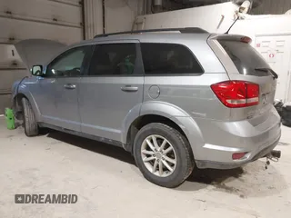 2015 Dodge Journey SXT with VIN 3C4PDDBG4FT544162, listed as a IAAI auction lot 41320028 with 128,475 mi miles and . Bid and sale history available at DreamBid. Image 3.
