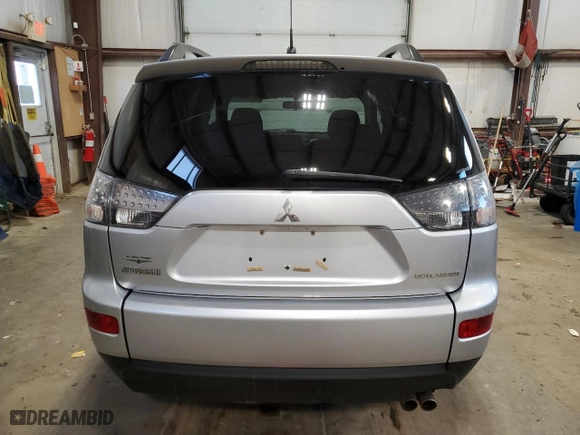 2009 Mitsubishi Outlander XLS with VIN JA4MT31X99Z606843, listed as a Copart auction lot 42054525 with 202,293 mi miles and Salvage Title. Bid and sale history available at carsss.com. Image 6.