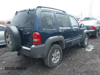2002 Jeep Liberty Sport with VIN 1J8GL48K32W132617, listed as a IAAI auction lot 41732799 with 202,894 mi miles. Bid and sale history available at carsss.com. Image 4.