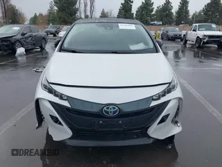 2021 Toyota Prius LE with VIN JTDKAMFP0M3169019, listed as a IAAI auction lot 41481098 with 84,304 mi miles and . Bid and sale history available at DreamBid. Image 12.