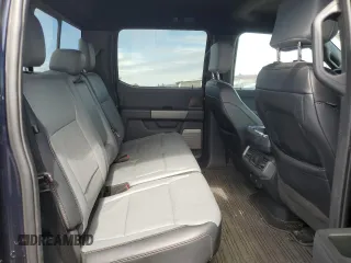 2022 Ford F-150 Lightning Pro z VIN 1FTVW1EL9NWG10318, wystawiony jako Copart lot #47857805 z przebiegiem 33 470 mil mil oraz Szkoda całkowita • Salvage title. Historia ofert i sprzedaży dostępna na DreamBid. Obrazek 10.