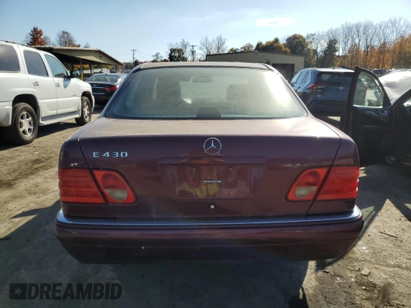 1998 Mercedes-Benz E with VIN WDBJF70F1WA503781, listed as a Copart auction lot 77284784 with Not Provided miles and Clean Title. Bid and sale history available at DreamBid. Image 6.