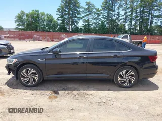 2020 Volkswagen Jetta SEL z VIN 3VWEB7BU2LM052964, wystawiony jako IAAI lot #42316780 z przebiegiem 79 929 mil mil oraz . Historia ofert i sprzedaży dostępna na DreamBid. Obrazek 15.
