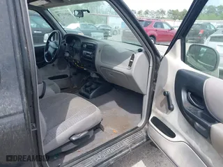 1999 Ford Ranger XL with VIN 1FTYR14V4XPAH7293, listed as a IAAI auction lot 41965378 with 149,959 mi miles. Bid and sale history available at carsss.com. Image 5.