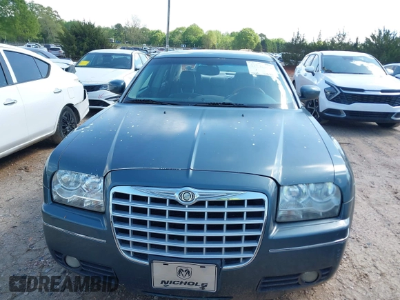 2005 Chrysler 300 with VIN 2C3AA53G35H157083, listed as a IAAI auction lot 41945392 with 192,215 mi miles. Bid and sale history available at carsss.com. Image 12.