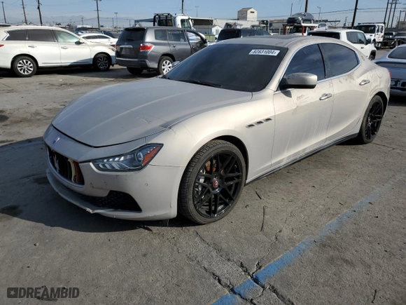 2014 Maserati Ghibli S Q4 with VIN ZAM57RTA8E1095303, listed as a Copart auction lot 82831004 with NaN miles and Salvage Title. Bid and sale history available at carsss.com. Image 1.