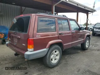 2000 Jeep Cherokee with VIN 1J4FF48SXYL198290, listed as a Copart auction lot 66026705 with 201,409 mi miles and Clean title. Bid and sale history available at DreamBid. Image 3.