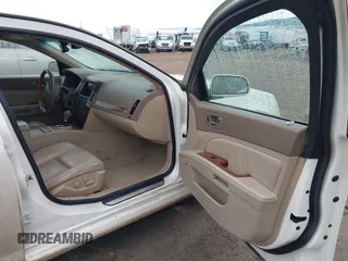 2005 Cadillac STS z VIN 1G6DC67A250231552, wystawiony jako IAAI lot #41765312 z przebiegiem 201 611 mil mil oraz . Historia ofert i sprzedaży dostępna na DreamBid. Obrazek 5.
