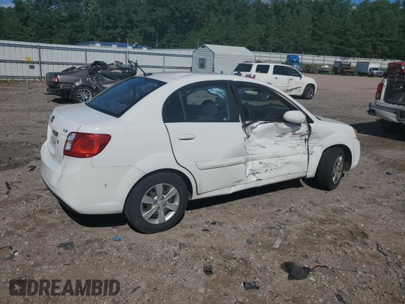 2010 Kia Rio LX with VIN KNADH4A31A6635895, listed as a Copart auction lot 61308434 with 209,016 mi miles and Salvage Title. Bid and sale history available at carsss.com. Image 3.