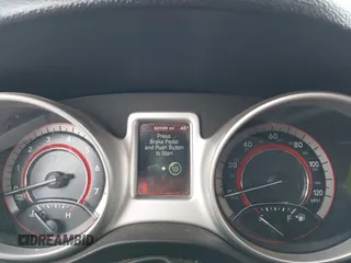 2019 Dodge Journey SE z VIN 3C4PDCBB5KT861358, wystawiony jako IAAI lot #41947841 z przebiegiem 82 099 mil mil oraz . Historia ofert i sprzedaży dostępna na DreamBid. Obrazek 7.
