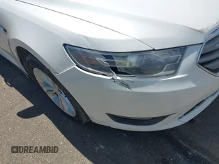 2015 Ford Taurus SEL z VIN 1FAHP2E82FG105766, wystawiony jako IAAI lot #42327700 z przebiegiem 187 185 mil mil oraz . Historia ofert i sprzedaży dostępna na DreamBid. Obrazek 12.