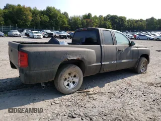 2008 Dodge Dakota z VIN 1D7HW32K58S571930, wystawiony jako Copart lot #69245074 z przebiegiem Nie podano mil oraz Szkoda całkowita • Salvage title. Historia ofert i sprzedaży dostępna na DreamBid. Obrazek 3.