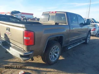 2014 GMC Sierra 1500 SLT with VIN 3GTU2VEC4EG216206, listed as a IAAI auction lot 41082064 with 249,332 mi miles and . Bid and sale history available at DreamBid. Image 4.