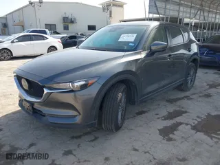 2019 Mazda CX-5 Touring with VIN JM3KFACMXK0686957, listed as a IAAI auction lot 41720338 with 95,421 mi miles. Bid and sale history available at carsss.com. Image 18.