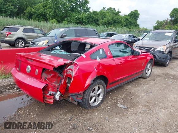 2007 Ford Mustang Deluxe with VIN 1ZVFT80N875206771, listed as a IAAI auction lot 42672678 with 163,045 mi miles and . Bid and sale history available at DreamBid. Image 4.
