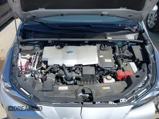 2021 Toyota Prius LE z VIN JTDL9MFU3M3028805, wystawiony jako IAAI lot #42043610 z przebiegiem 26 436 mil mil oraz . Historia ofert i sprzedaży dostępna na DreamBid. Obrazek 10.