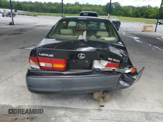 1998 Lexus ES 300 z VIN JT8BF28G7W5048920, wystawiony jako Copart lot #56391015 z przebiegiem 234 109 mil mil oraz Nie do naprawy • Non repairable. Historia ofert i sprzedaży dostępna na DreamBid. Obrazek 6.