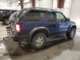 1999 Chevrolet Blazer LS с VIN 1GNCT18W9XK157387, выставлен на аукционе Copart как лот 49667765 с пробегом 182 411 миль миль и Списание • Salvage title. История ставок и продаж доступна на DreamBid. Изображение 3.