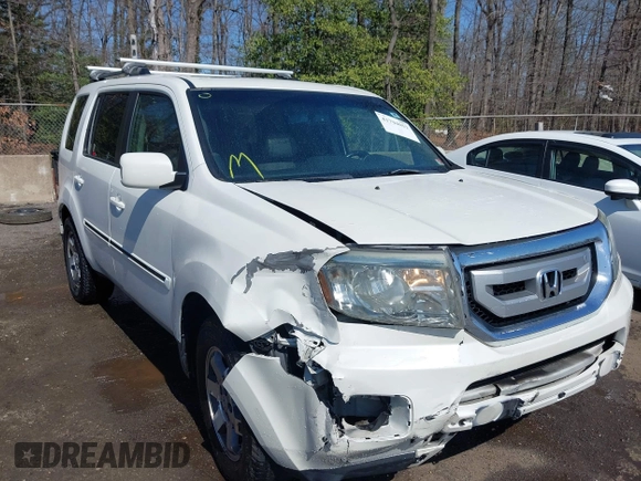 2011 Honda Pilot Touring with VIN 5FNYF4H96BB014095, listed as a IAAI auction lot 41794052 with 202,440 mi miles and . Bid and sale history available at DreamBid. Image 6.