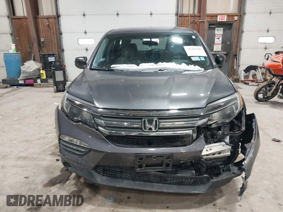 2016 Honda Pilot LX with VIN 5FNYF6H1XGB111488, listed as a IAAI auction lot 41581706 with 100,028 mi miles. Bid and sale history available at carsss.com. Image 12.