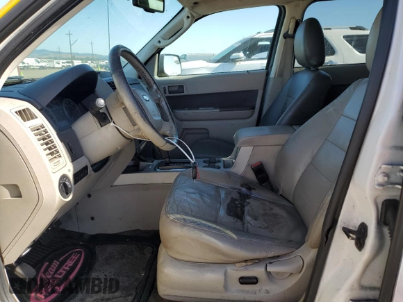 2010 Ford Escape Hybrid with VIN 1FMCU4K3XAKB42955, listed as a Copart auction lot 57533165 with 389,929 mi miles and Clean title. Bid and sale history available at DreamBid. Image 7.