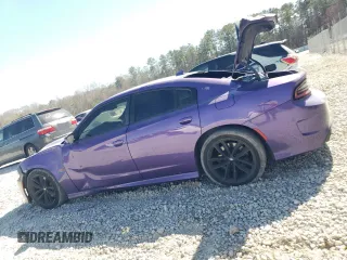 2019 Dodge Charger Scat Pack with VIN 2C3CDXGJ0KH748551, listed as a Copart auction lot 46957405 with 72,279 mi miles and Salvage Title. Bid and sale history available at DreamBid. Image 2.