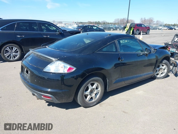 2011 Mitsubishi Eclipse GS with VIN 4A31K5DF1BE002479, listed as a IAAI auction lot 41880392 with 130,225 mi miles. Bid and sale history available at carsss.com. Image 4.