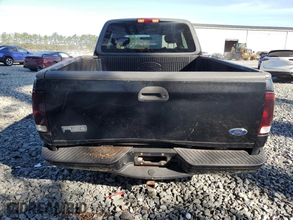 2002 Ford F-150 XL with VIN 1FTRX17L42NB06983, listed as a Copart auction lot 54172855 with 150,243 mi miles and Salvage title. Bid and sale history available at DreamBid. Image 6.