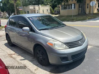 2009 Nissan Versa S with VIN 3N1BC13E19L499018, listed as a Copart auction lot 56711385 with 196,451 mi miles and Clean Title. Bid and sale history available at DreamBid. Image 1.