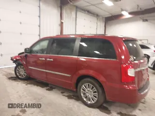 2015 Chrysler Town & Country Touring L with VIN 2C4RC1CG8FR525304, listed as a IAAI auction lot 41829438 with 125,587 mi miles and . Bid and sale history available at DreamBid. Image 3.