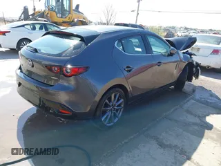 2023 Mazda 3 S Preferred with VIN JM1BPALM6P1610353, listed as a IAAI auction lot 42144106 with 55,131 mi miles and . Bid and sale history available at DreamBid. Image 4.