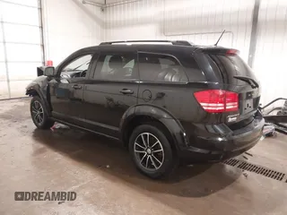 2017 Dodge Journey SE z VIN 3C4PDCAB4HT695490, wystawiony jako IAAI lot #41301719 z przebiegiem 103 642 mil mil oraz . Historia ofert i sprzedaży dostępna na DreamBid. Obrazek 3.