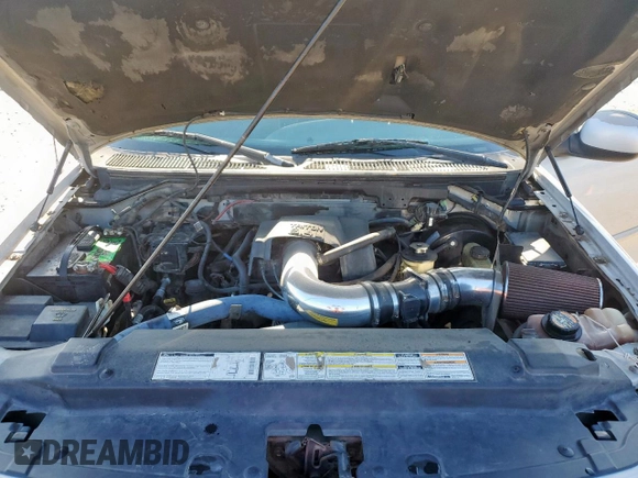 2000 Ford F-150 XL с VIN 1FTRX17L6YKB45245, выставлен на аукционе Copart как лот 62365195 с пробегом 306 210 миль миль и Списание • Salvage title. История ставок и продаж доступна на DreamBid. Изображение 11.