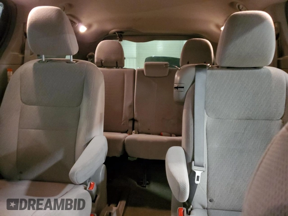 2015 Toyota Sienna LE AAS с VIN 5TDKK3DC2FS677288, выставлен на аукционе Copart как лот 57882845 с пробегом 162 458 миль миль и Списание • Salvage title. История ставок и продаж доступна на DreamBid. Изображение 10.