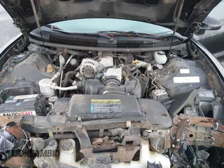2000 Pontiac Firebird Firebird z VIN 2G2FS22K7Y2140141, wystawiony jako IAAI lot #41219773 z przebiegiem Nie podano mil oraz . Historia ofert i sprzedaży dostępna na DreamBid. Obrazek 10.