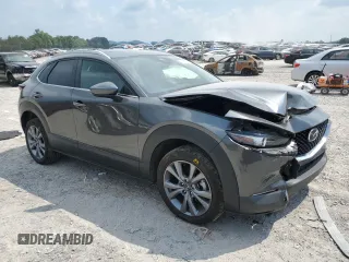 2024 Mazda CX-30 S Carbon Edition with VIN 3MVDMBCM1RM708265, listed as a Copart auction lot 62295055 with 20,404 mi miles and Salvage title. Bid and sale history available at DreamBid. Image 4.