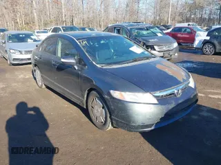 2006 Honda Civic z VIN JHMFA36206S001551, wystawiony jako IAAI lot #41360363 z przebiegiem 233 949 mil mil oraz . Historia ofert i sprzedaży dostępna na DreamBid. Obrazek 1.