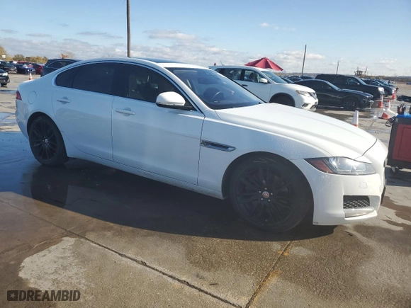 2016 Jaguar XF 35t Prestige with VIN SAJBE4BV8GCY02512, listed as a Copart auction lot 84510554 with 135,293 mi miles and Salvage Title. Bid and sale history available at carsss.com. Image 4.