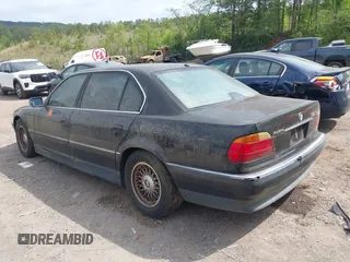 1999 BMW 7 Series 740il with VIN WBAGH8334XDP01166, listed as a IAAI auction lot 42073939 with 1 mi miles. Bid and sale history available at carsss.com. Image 3.