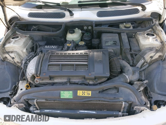 2006 MINI Hardtop S with VIN WMWRE33596TJ37959, listed as a IAAI auction lot 42635457 with 124,440 mi miles and . Bid and sale history available at DreamBid. Image 10.