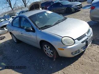 2004 Dodge Neon SXT with VIN 1B3ES56C94D526657, listed as a IAAI auction lot 41851474 with 203,964 mi miles. Bid and sale history available at carsss.com. Image 1.