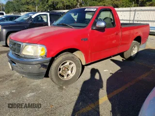 1997 Ford F-150 with VIN 1FTDF17W0VND23989, listed as a Copart auction lot 80884714 with 209,659 mi miles and Salvage title. Bid and sale history available at DreamBid. Image 1.