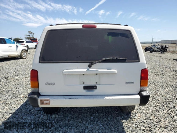 2000 Jeep Cherokee with VIN 1J4FT48S6YL152495, listed as a Copart auction lot 60627965 with 196,086 mi miles and Salvage title. Bid and sale history available at DreamBid. Image 6.