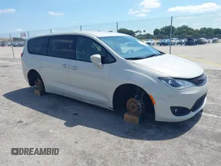 2020 Chrysler Pacifica Touring with VIN 2C4RC1FG2LR149545, listed as a IAAI auction lot 42082770 with 62,237 mi miles and . Bid and sale history available at DreamBid. Image 1.