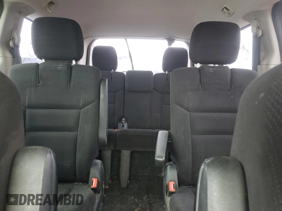 2015 Dodge Grand Caravan SE with VIN 2C4RDGBG7FR516773, listed as a Copart auction lot 52035135 with 132,122 mi miles and Salvage Title. Bid and sale history available at DreamBid. Image 10.