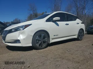 2018 Nissan LEAF SV z VIN 1N4AZ1CP9JC302143, wystawiony jako Copart lot #51405215 z przebiegiem 117 266 mil mil oraz Czysty tytuł • Clean title. Historia ofert i sprzedaży dostępna na DreamBid. Obrazek 1.