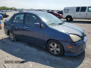 2002 Suzuki Aerio S z VIN JS2RA41S225109275, wystawiony jako Copart lot #52689585 z przebiegiem 195 612 mil mil oraz Tytuł czysty. Historia ofert i sprzedaży dostępna na DreamBid. Obrazek 4.