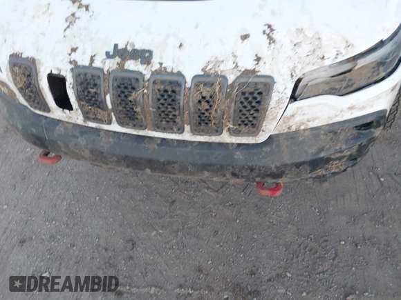 2021 Jeep Cherokee Trailhawk with VIN 1C4PJMBX4MD153086, listed as a IAAI auction lot 41132030 with 56,367 mi miles and . Bid and sale history available at DreamBid. Image 19.