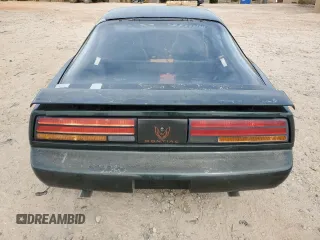 1991 Pontiac Firebird z VIN 1G2FS23T9ML201636, wystawiony jako Copart lot #53856725 z przebiegiem 1 278 739 mil mil oraz Czysty tytuł • Clean title. Historia ofert i sprzedaży dostępna na DreamBid. Obrazek 6.